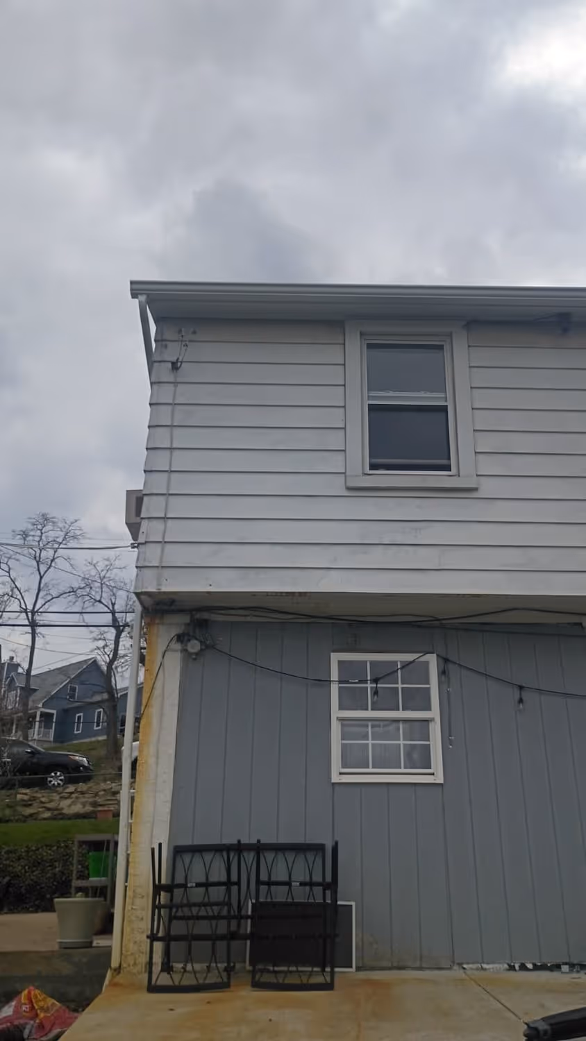Margray, after: new gutter and downspout